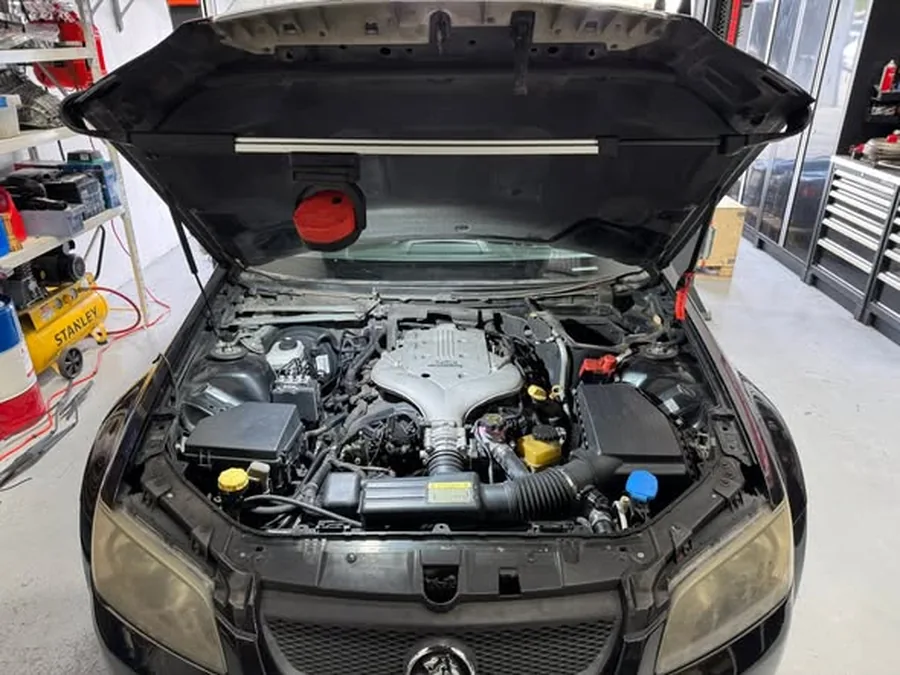 Engine bay workshop photo from public D1 social profile